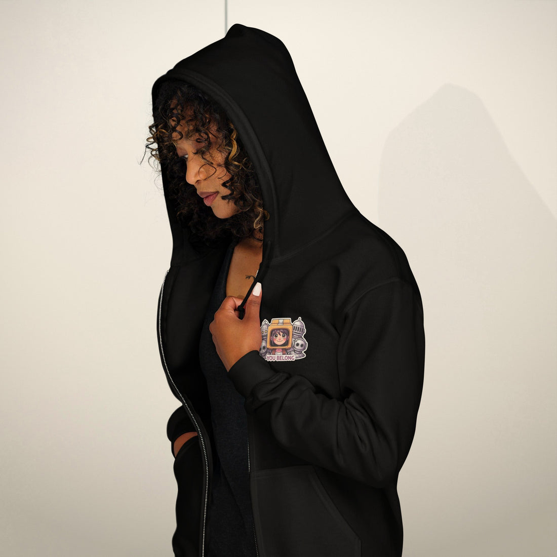 Model wearing the You Belong Zip Hoodie with the hood up
